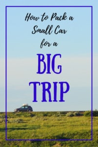 A scene of blue sky and green grass with a small grey car. Words: How to Pack a Small Car for a Big Trip