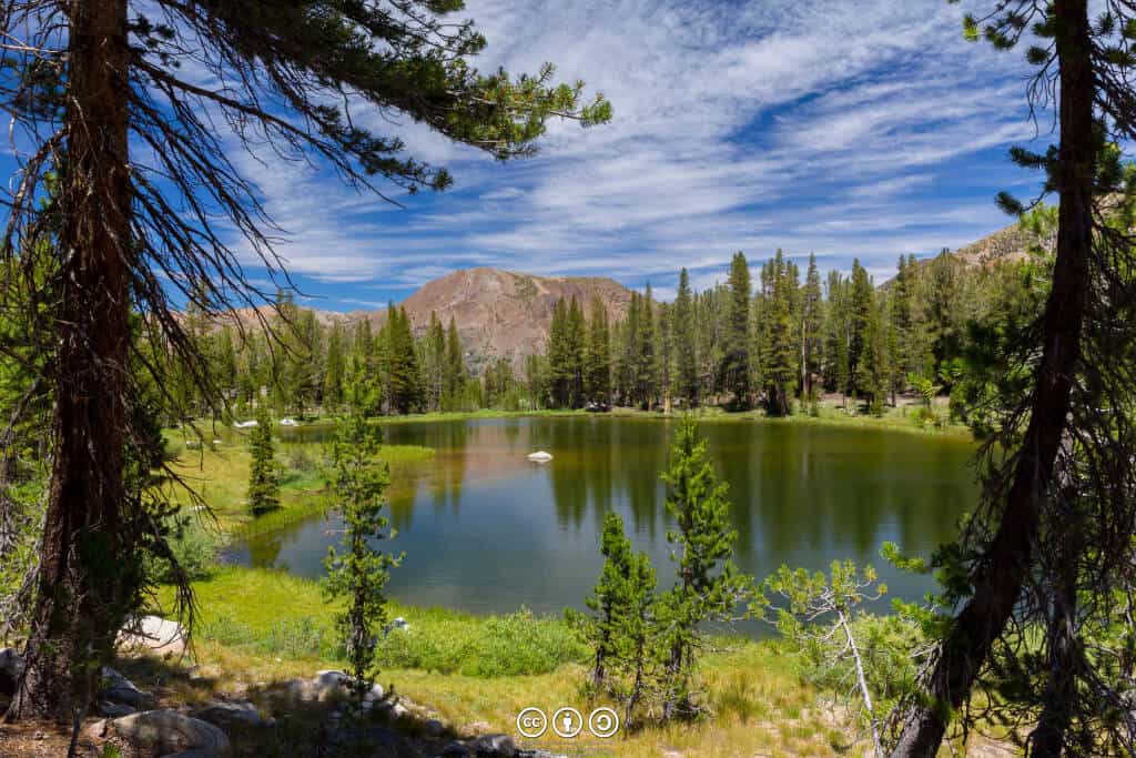 A blue-sky view of a High Sierra pond by au_ears on Flickr