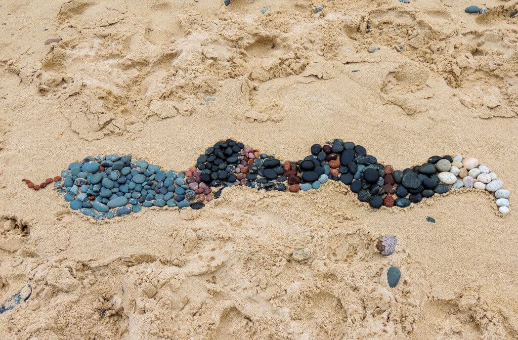 A snake made of rocks on Twelve Mile Beach at Pictured Rocks National Lakeshore