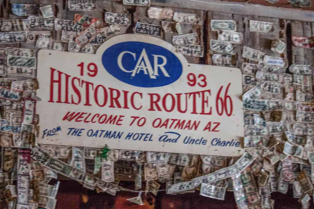 visit Oatman Arizona A close up of the dollar bills lining the wall in the Oatman Hotel
