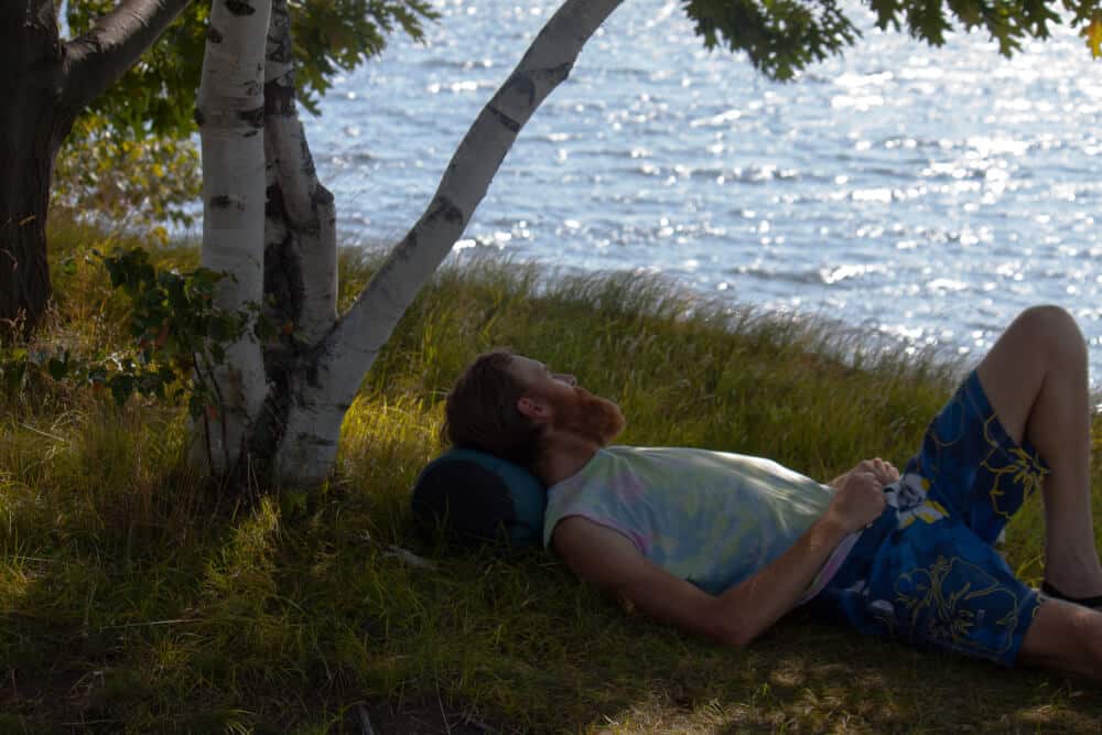 Woods Island State Park Eric relaxing in the grass at Woods Island State Park