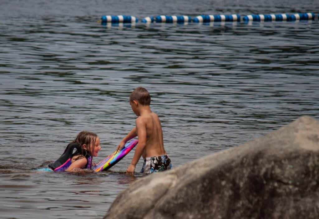 Groton State Forest Vermont Two young swimmers at Boulder Beach State Park
