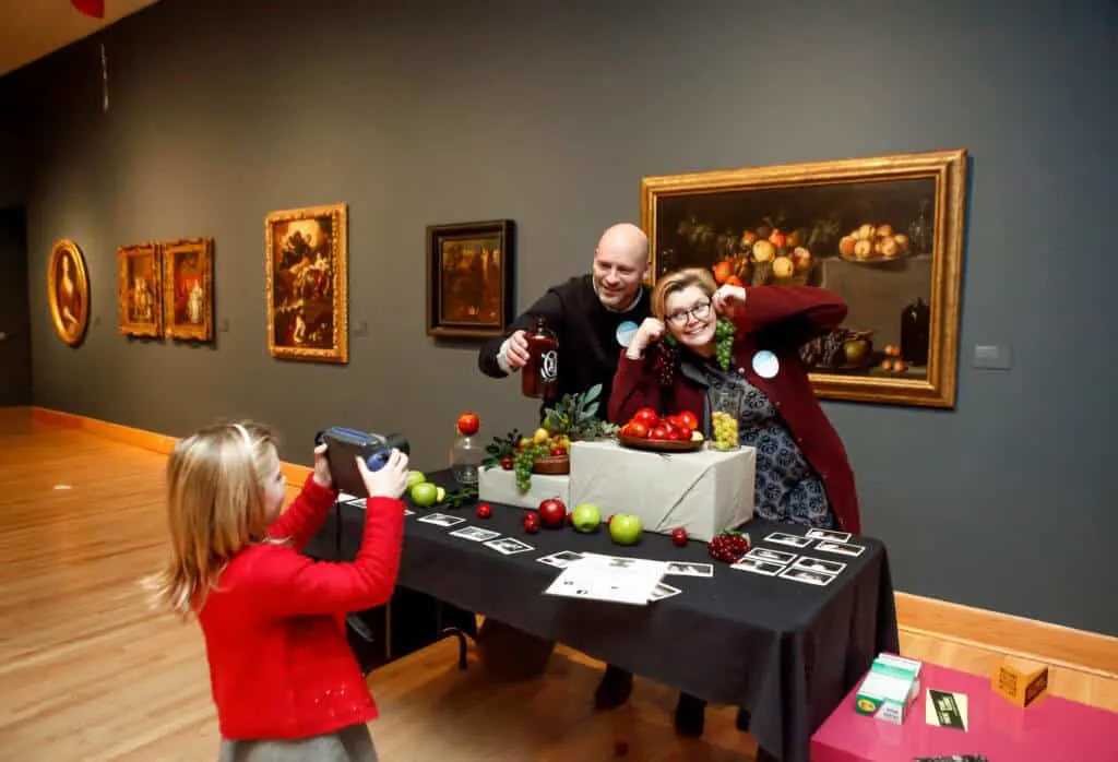 A young girl takes a photo at one of the galleries in the Williams College Museum of Art in the Berkshires.