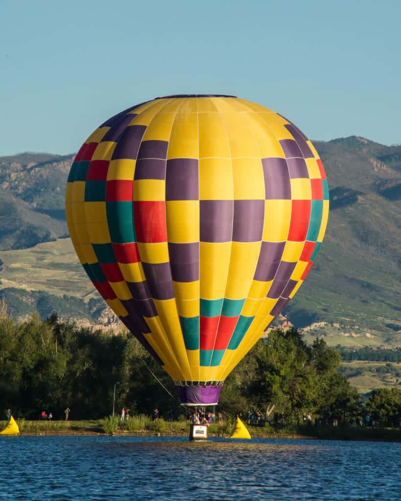 Best hot air balloon festivals A single colorful hot air balloon at the Colorado Springs Labor Day Lift Off
