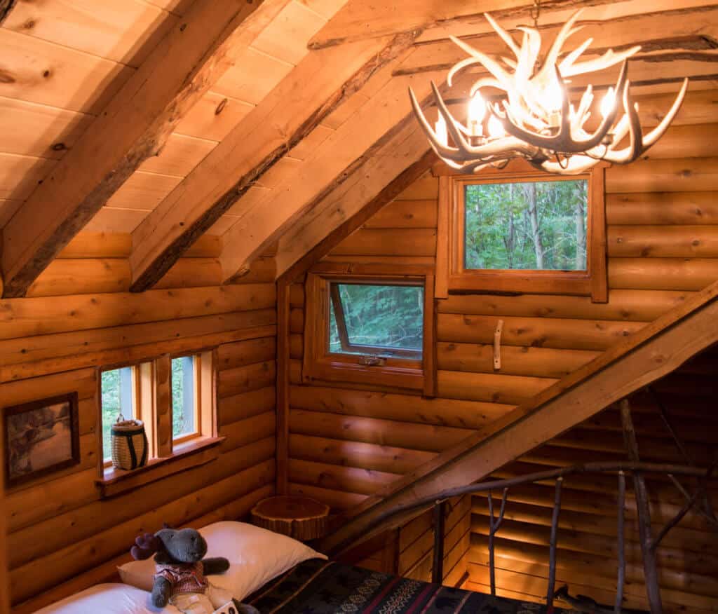 treehouse rental Vermont A view of the bedroom loft at the Moose Meadow Lodge Treehouse in Vermont