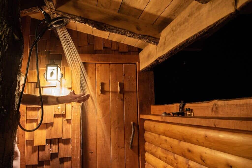 The outdoor shower at Moose Meadow treehouse near Waterbury, VT