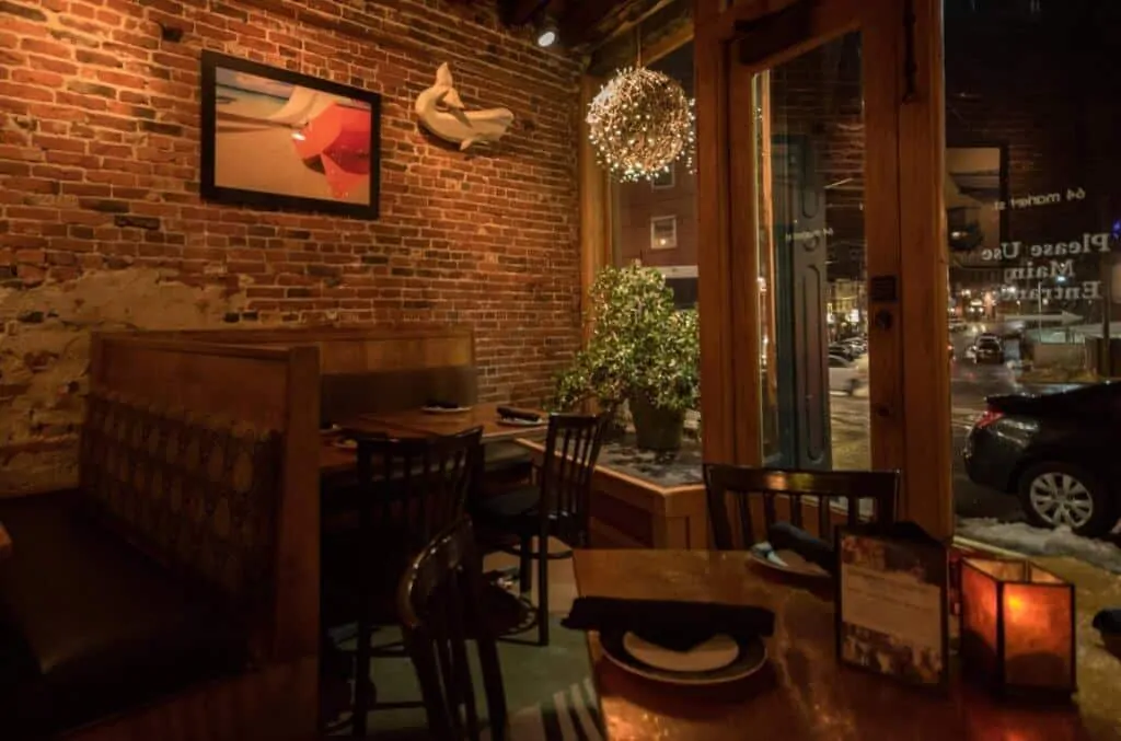 The dark and cozy interior of the Portsmouth Gas Light Co. in Portsmouth NH.