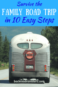 An old greyhound bus. Caption reads: Survive the Family Road Trip in 10 Easy Steps
