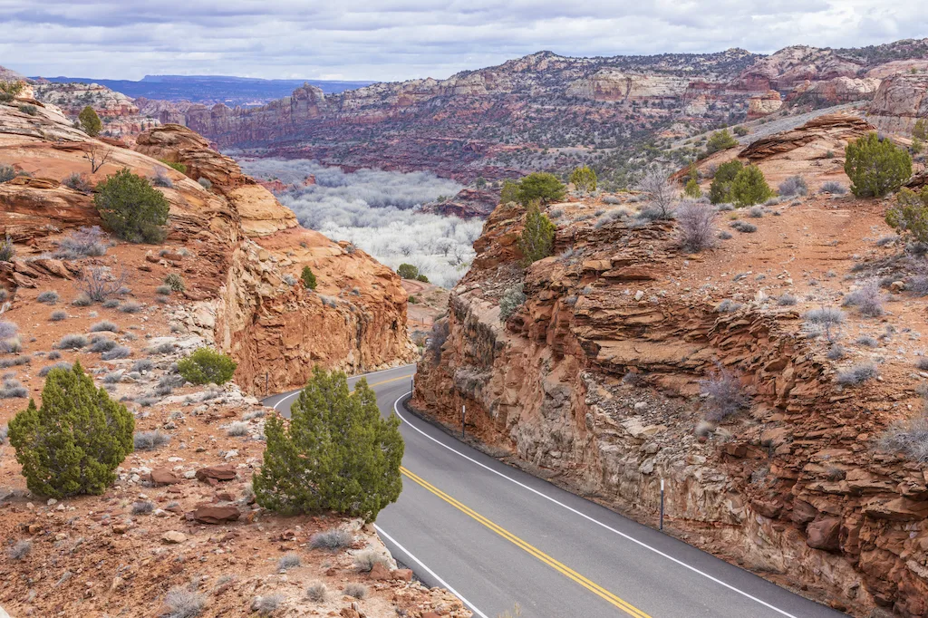A winding road through the red rocks on Highway 12 in Utah.