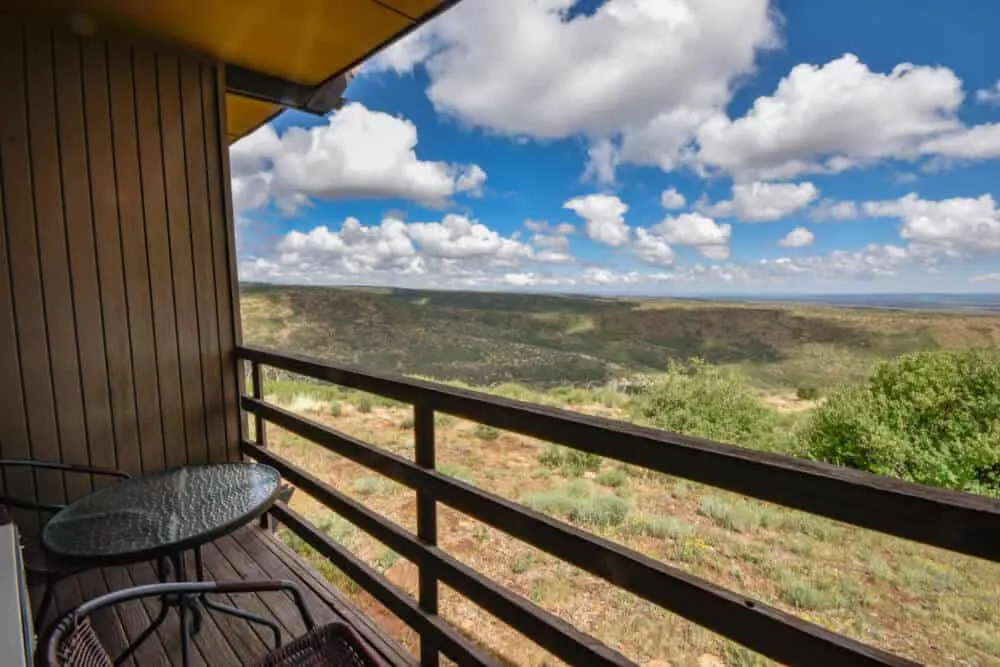 balcony view at far view lodge - mesas and cloudy skies