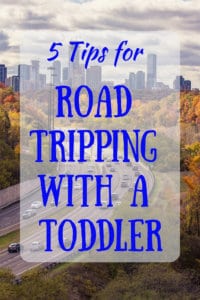 A arial view of a city with traffic. Caption: 5 Tips for Road Tripping with a Toddler