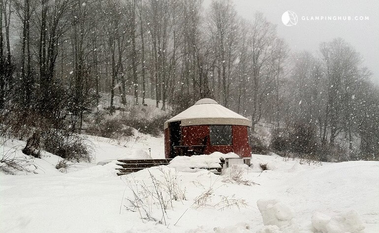 Winter view of a yurt rental in Waterville, New York