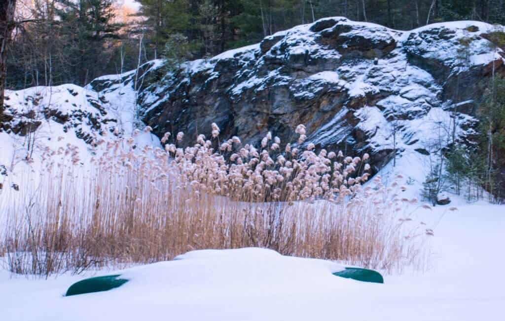 A canoe buried in the snow.
