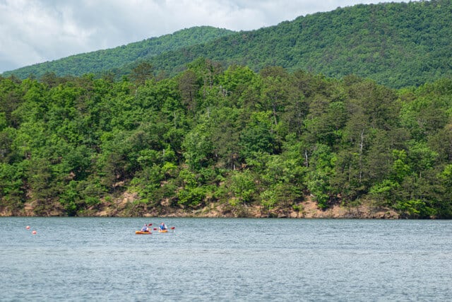 Two kayakers enjoying Carvins Cove Reservoir in Roanoke, VA.