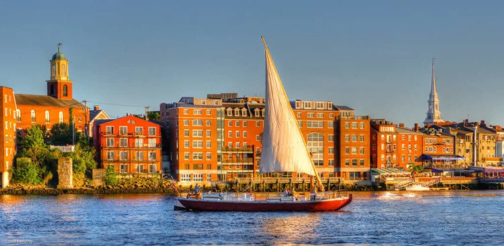 A Gundalow sails down the Piscataqua River in Portsmouth, NH. Photo credit: David J. Murray of ClearEyePhoto.com