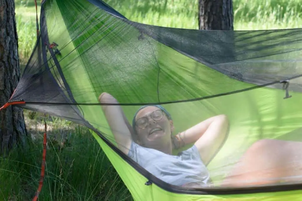 Abbey swings in the Kammok Mantis during a campsite respite.