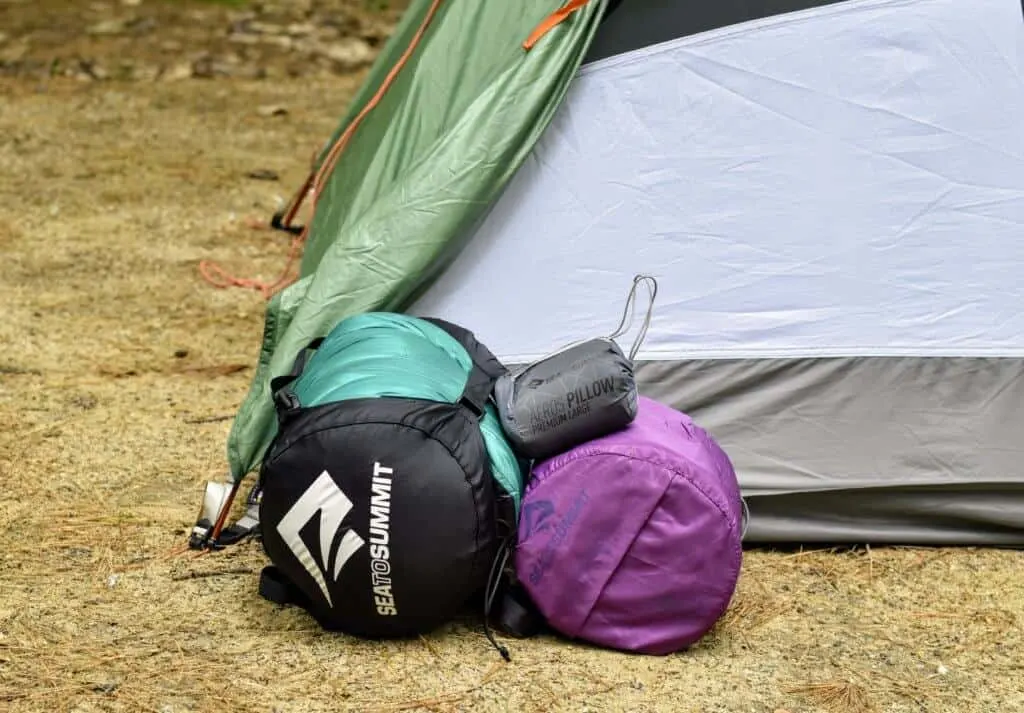 Sea to Summit sleeping bag, pad, and pillow, all in individual stuff sacks.