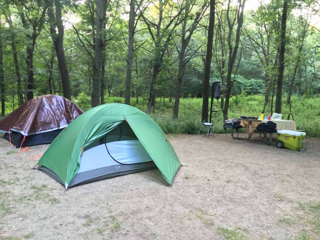 Two tents set up in a campsite at Indiana Dunes National Park.