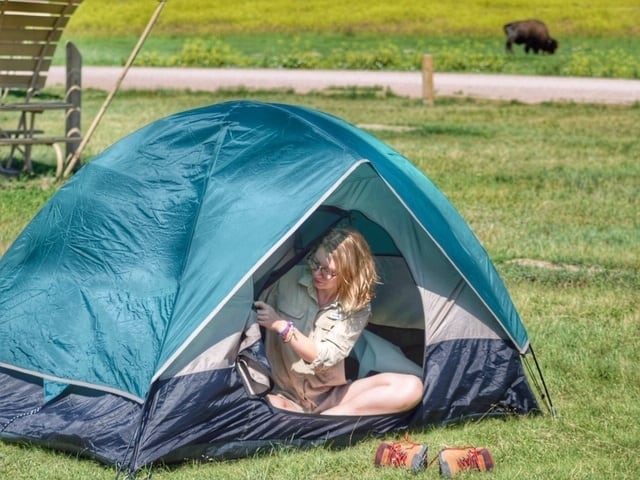 a tent set up at Sage Creek Campground in Badlands National Park