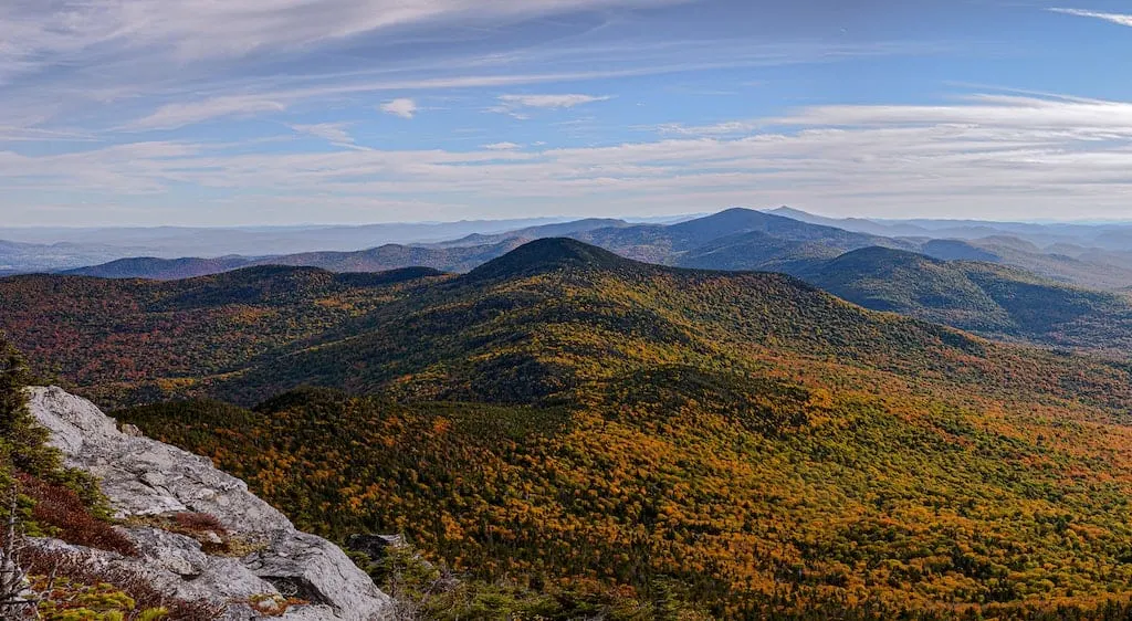 A fall foliage view from the top of Mount Mansfield in Stowe, Vermont.