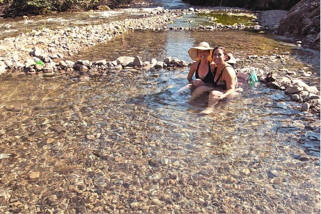 Two women soak in Bonneville Hot Springs in Idaho