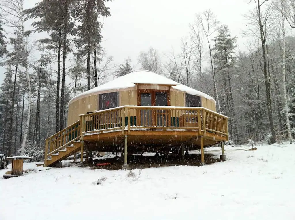 A yurt in a snowy woodland in upstate NY. Photo source: Airbnb