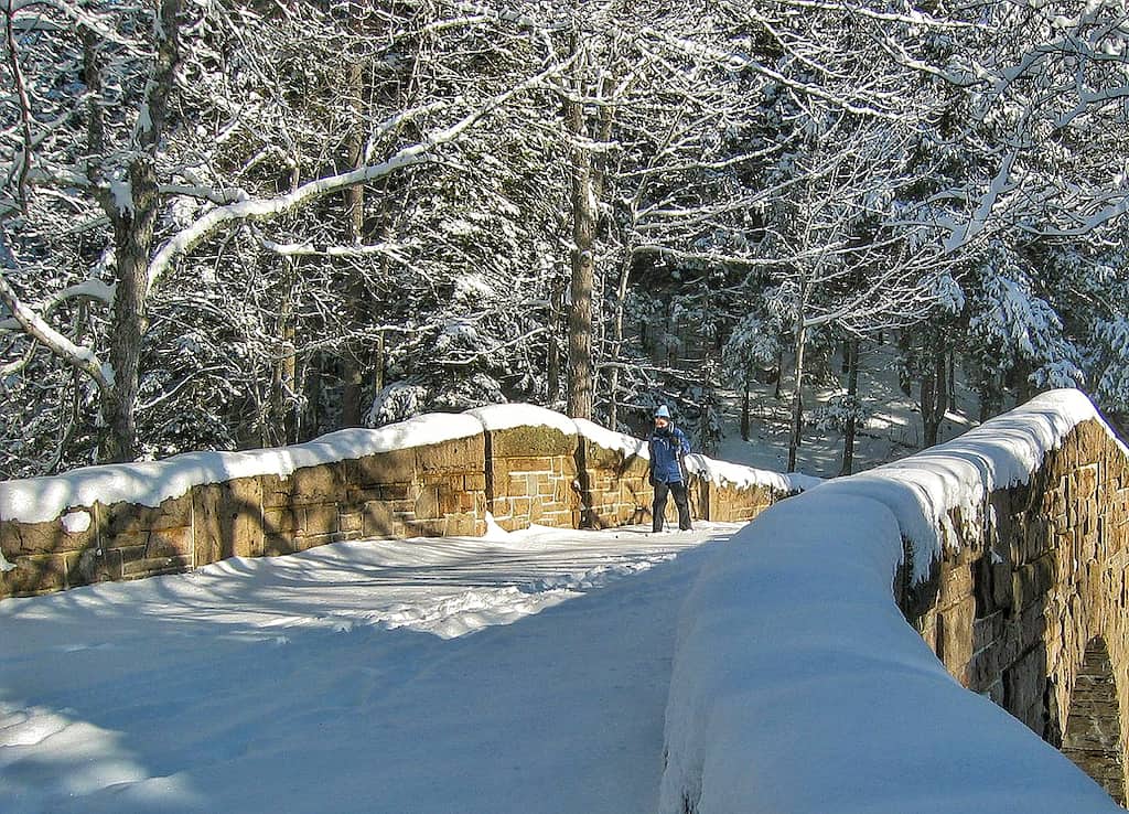 The carriage road covered with snow in Acadia National Park.