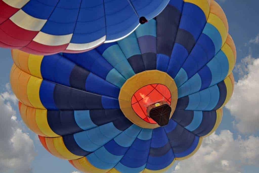 Beautiful hot air balloons against a cloudy sky.