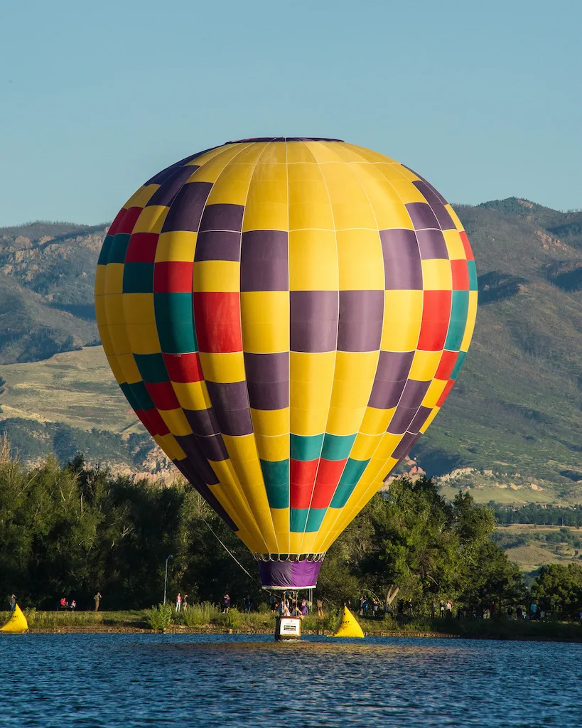 A hot air balloon takes to the sky as part of the Labor Day Lift Off in Colorado Springs