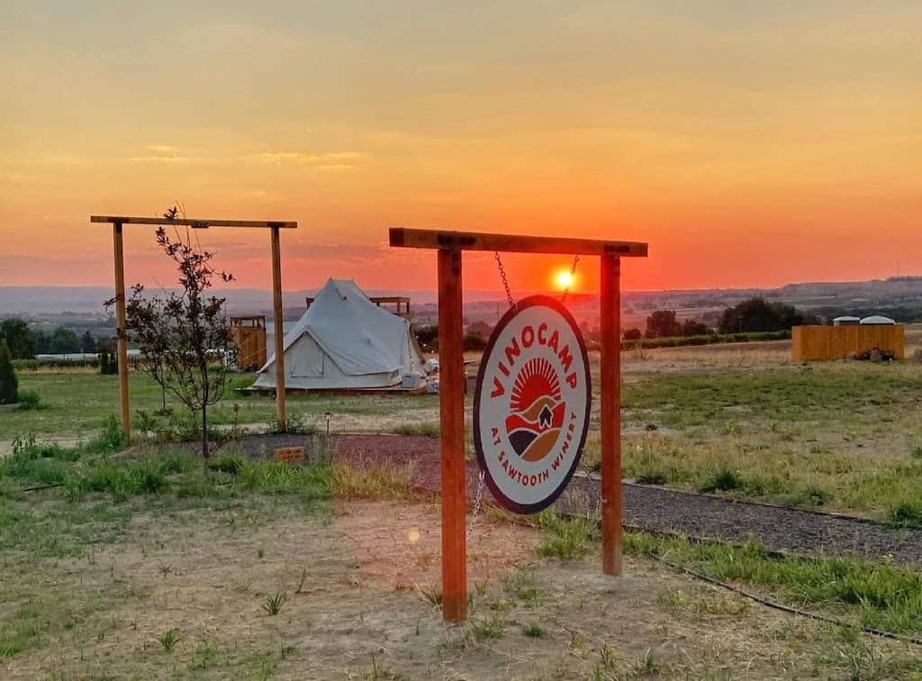 Discover the Sunnyslope Wine Trail in Caldwell, Idaho 10 The sunset over the glamping tents at Sawtooth Winery in Caldwell, Idaho.