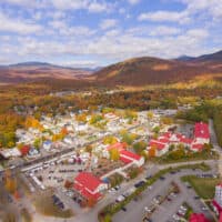An aerial view of RiverWalk Resort at Loon Mountain and the town of Lincoln, New Hampshire