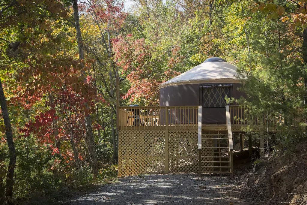 A beautiful yurt available for rent in Asheville, NC for your glamping trip on the Blue Ridge Parkway. Photo credit: VRBO