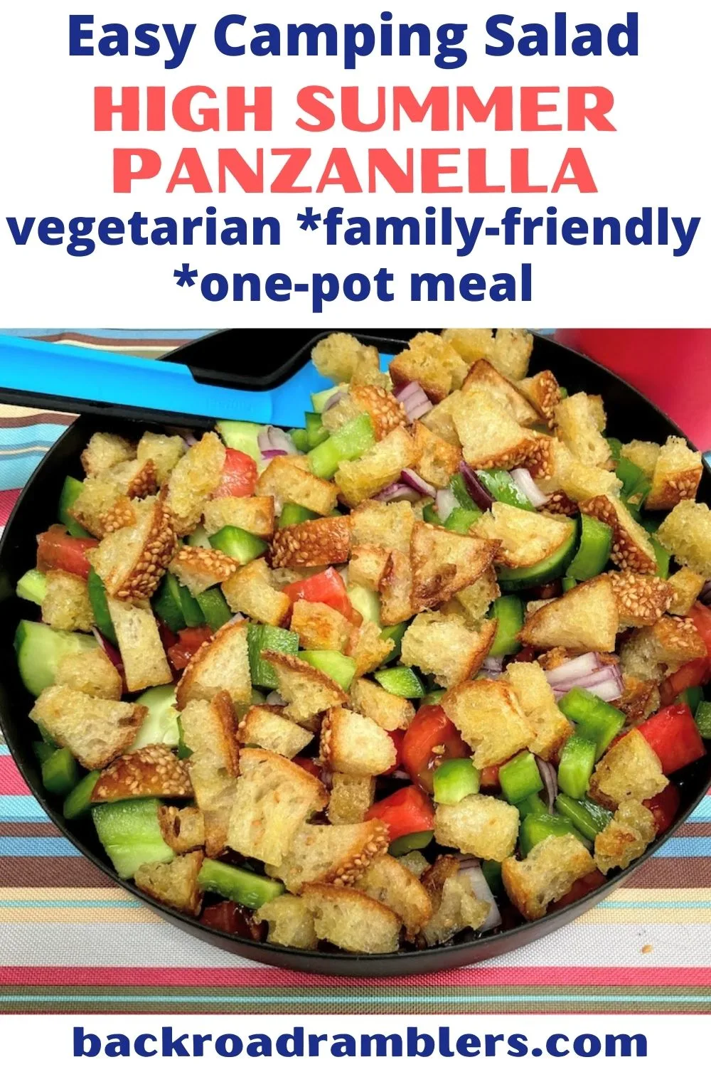 A photo of panzanella, an easy camping salad. Text overlay: Easy camping salad - High Summer Panzanella. Vegetarian, family-friendly, one-pot meal.