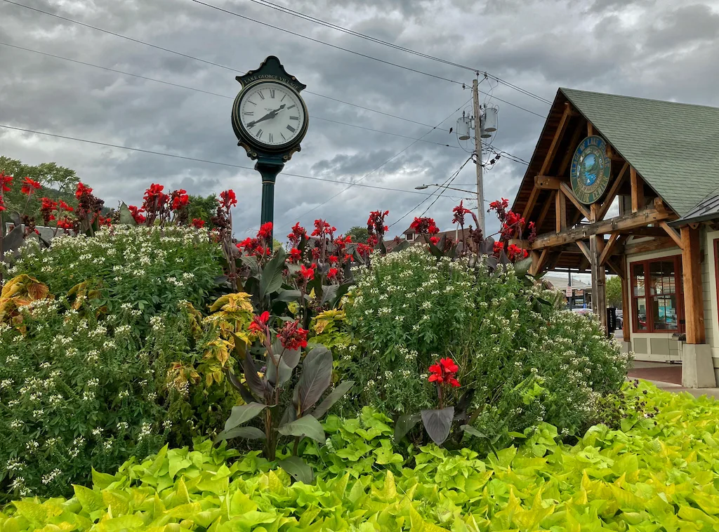 The gardens and clock in front of the Lake George Visitor Center in New York.
