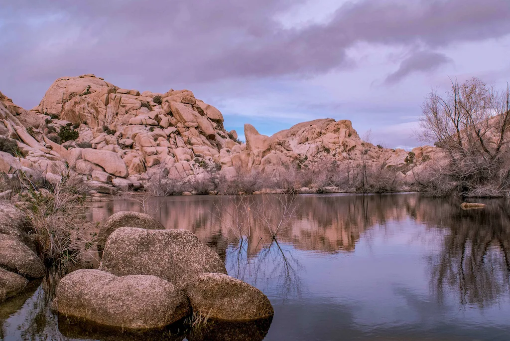 Sunset at Barker Dam in Joshua Tree National Park.