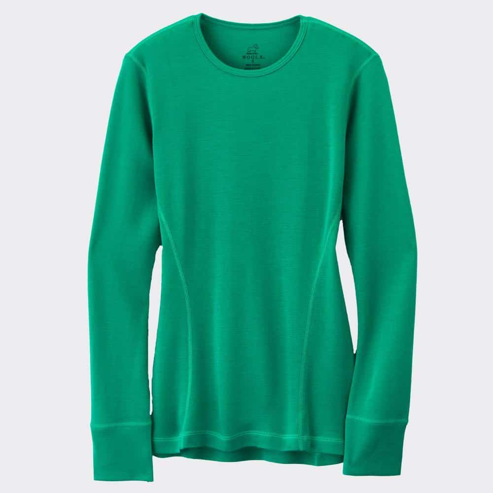 A green merino wool base layer by Woolx. 