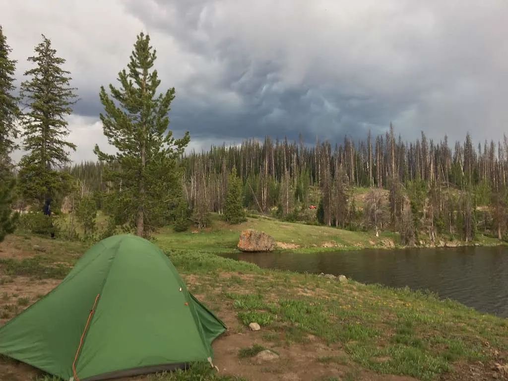 A small green tent set up at Pinnacles Campground in Wyoming.