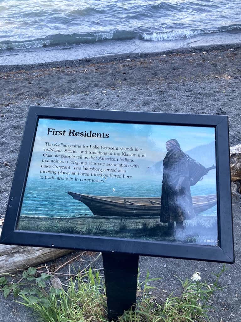 An informational sign about the first people who lived around Lake Crescent in Washington.