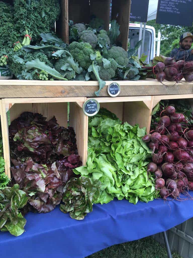 A table full of lettuce at the Burlington Farmers' Market in Vermont.