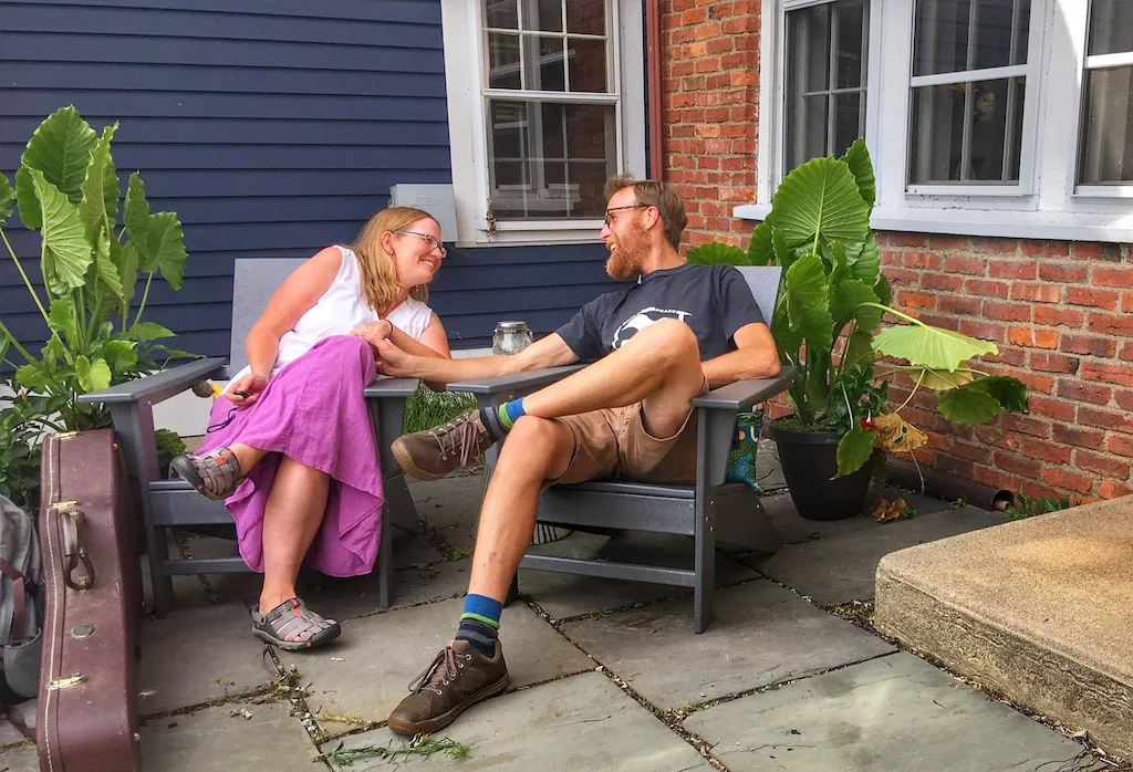 Tara and Eric sit in front of their lodging at the Water Street Inn in Kittery, Maine.