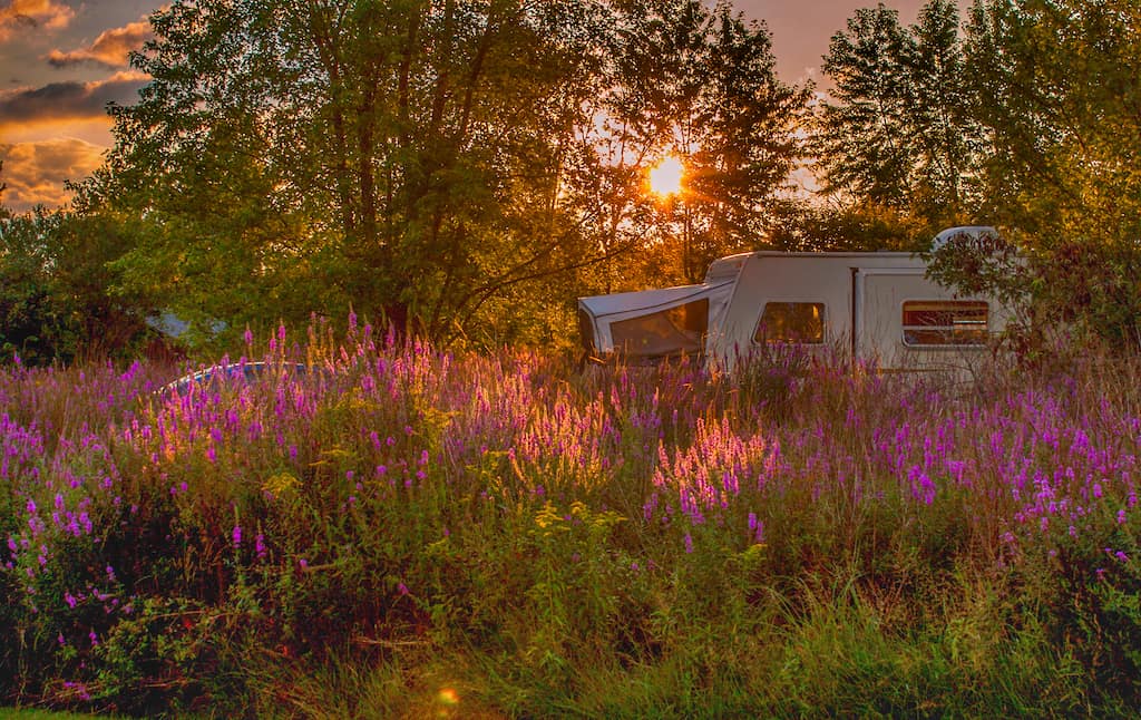 A camper in the sunset at Button Bay State Park in Vermont.