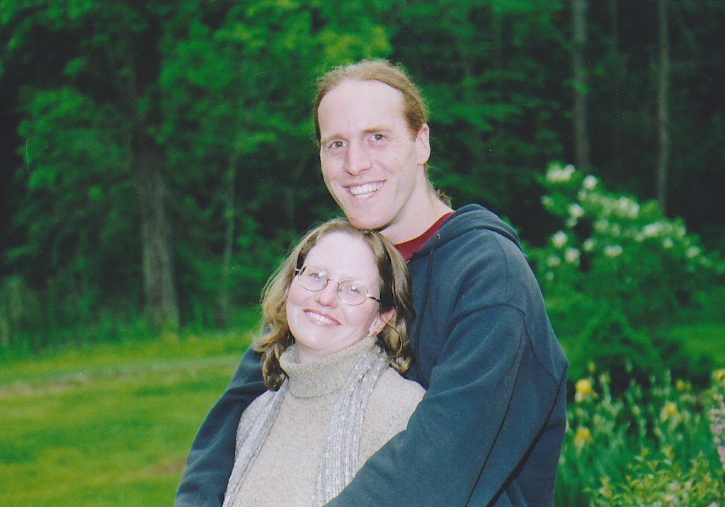 A young Tara and Eric posing for a photo.