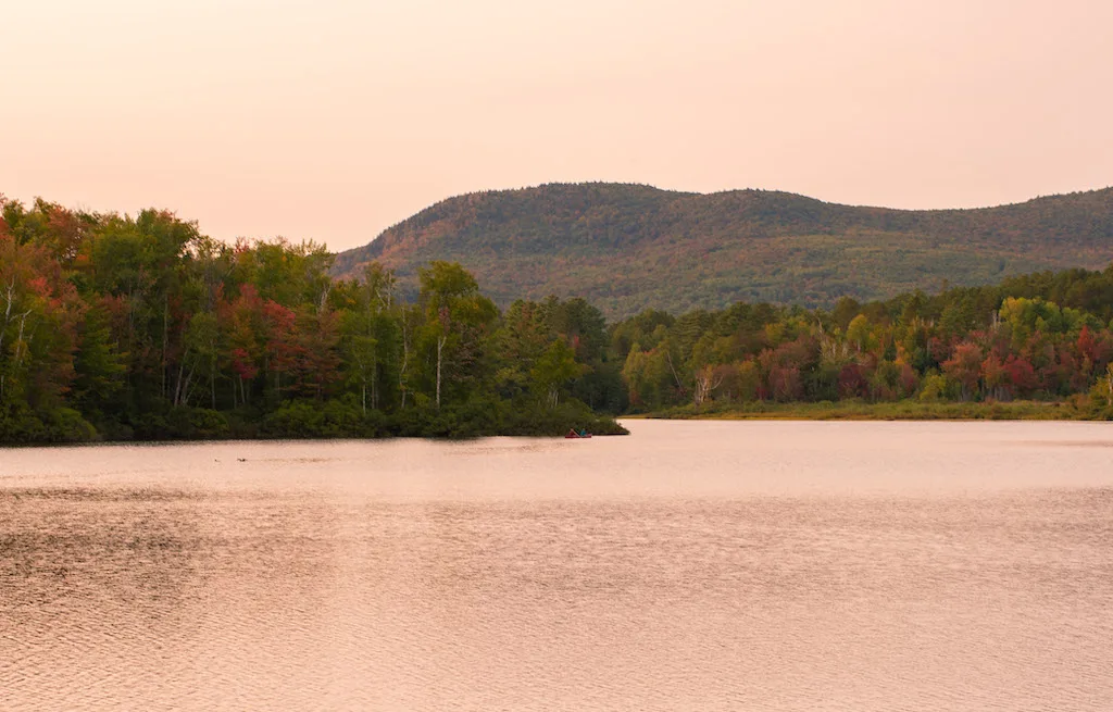 Sunset on Spectacle Pond in Brighton, Vermont.