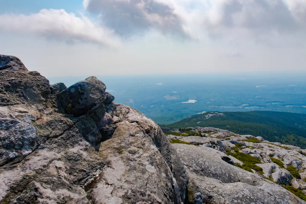 Distant views of lakes and ponds from the top of Mount Monadnock in New Hampshire. 