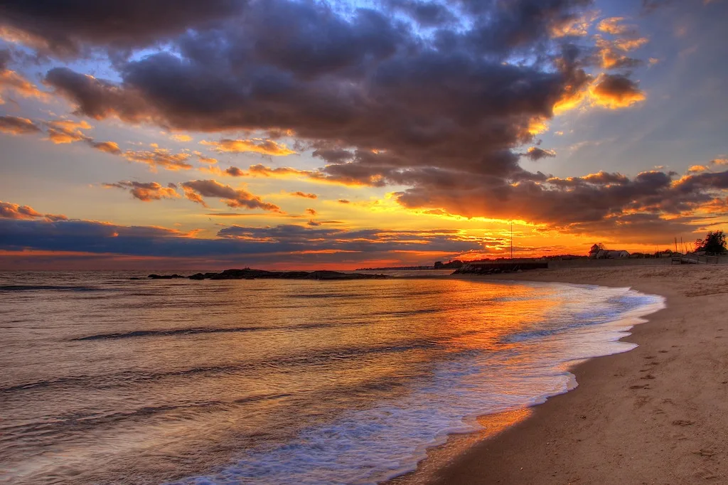 Surf Club beach in Madison, Connecticut at sunset.