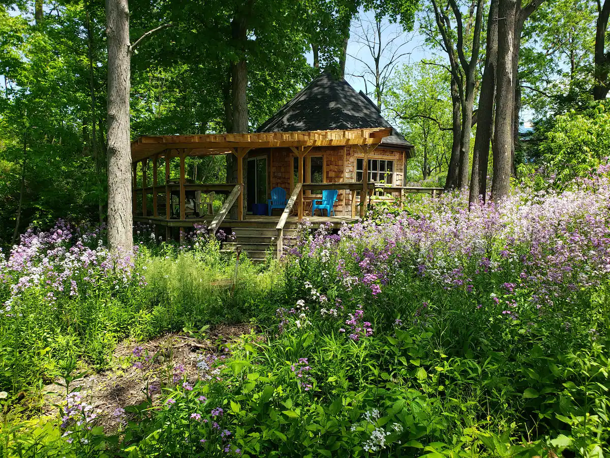 A tiny octagon house in the woods. Photo credit: Airbnb