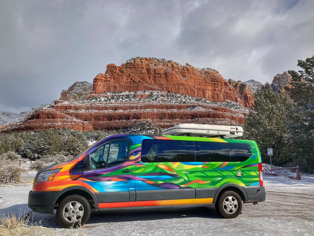 Our Escape Campervan rental in front of Brins Mesa in Sedona, Arizona.