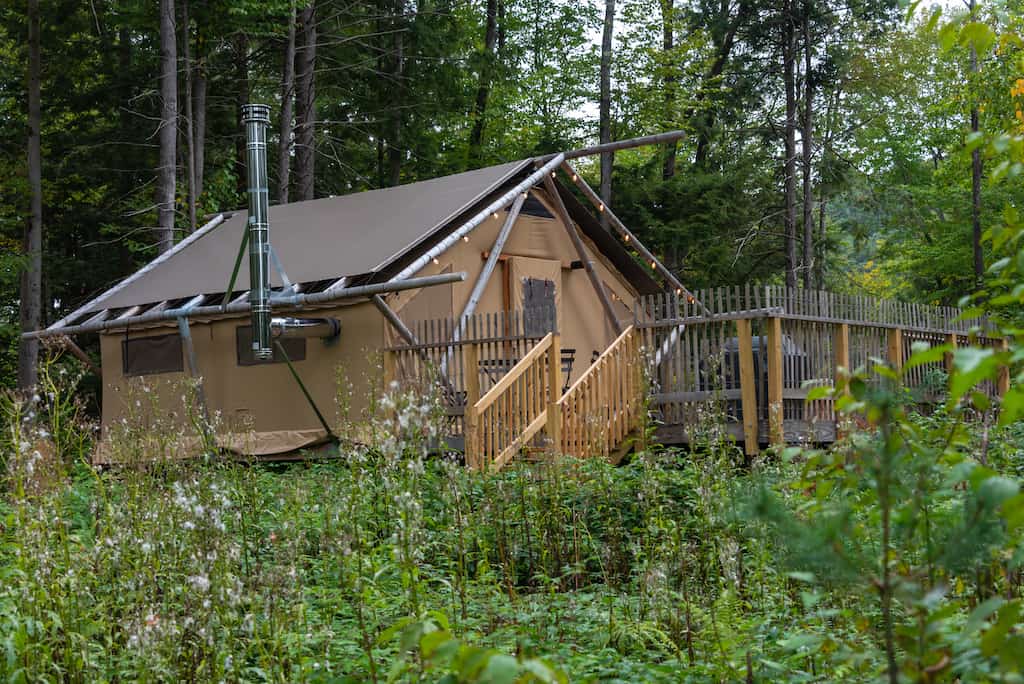 a glamping tent in Huttopia Adirondacks, one of the best things to do in the Adirondacks. 