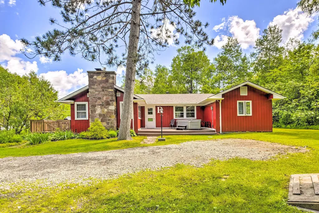sprawling red vacation rental in the Adirondacks.