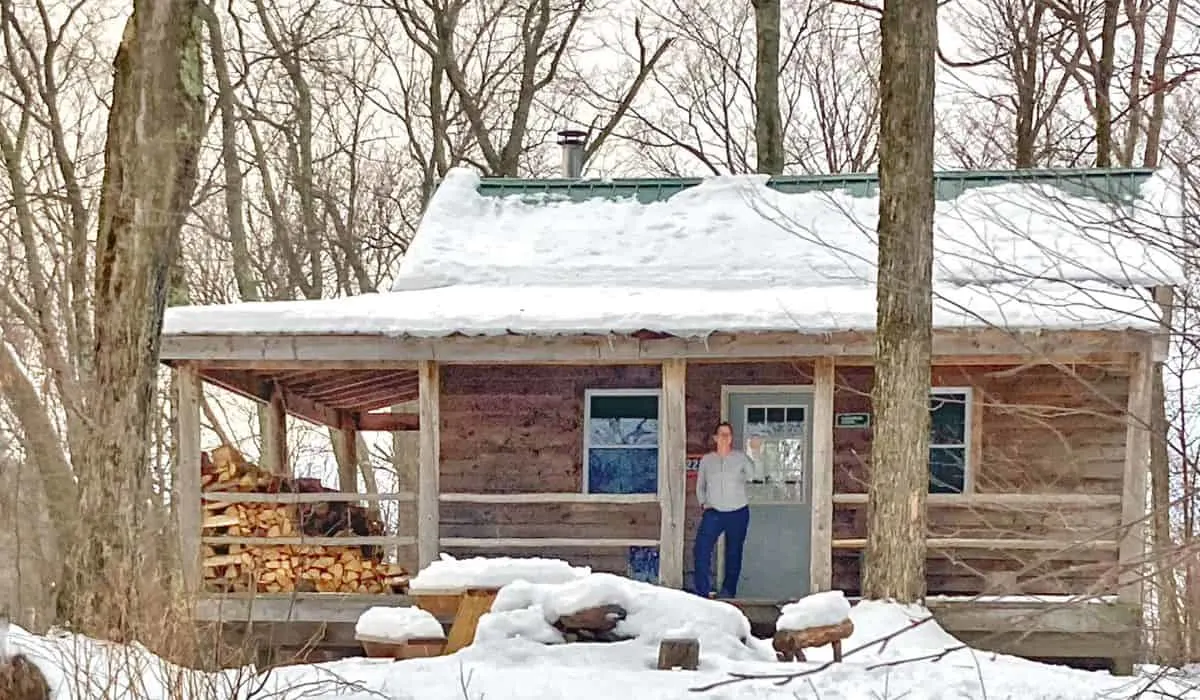 Nenorod Cabin covered with snow at Merck Forest in Rupert, Vermont.